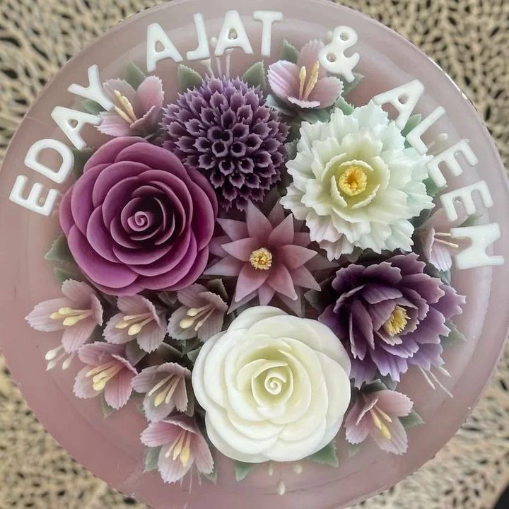 Purple and white rose jelly cake with a couple's names